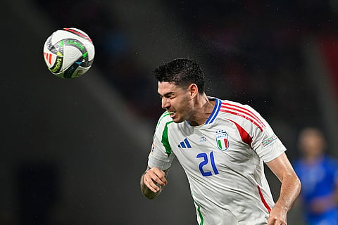 2024–25 UEFA Nations League, Israel vs Italy: Italy's Alessandro Bastoni heads the ball 